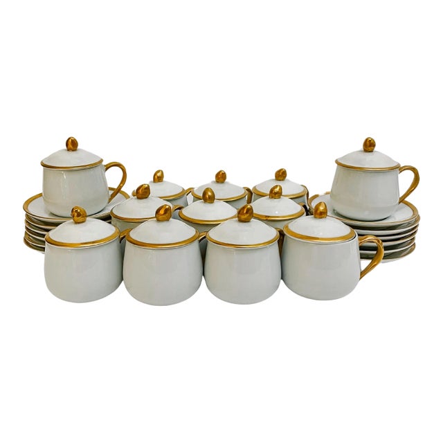 Complete set of twelve pots de creme with lids and underplates from the 1985 Palais Collection by Fitz and Floyd. Each pot...