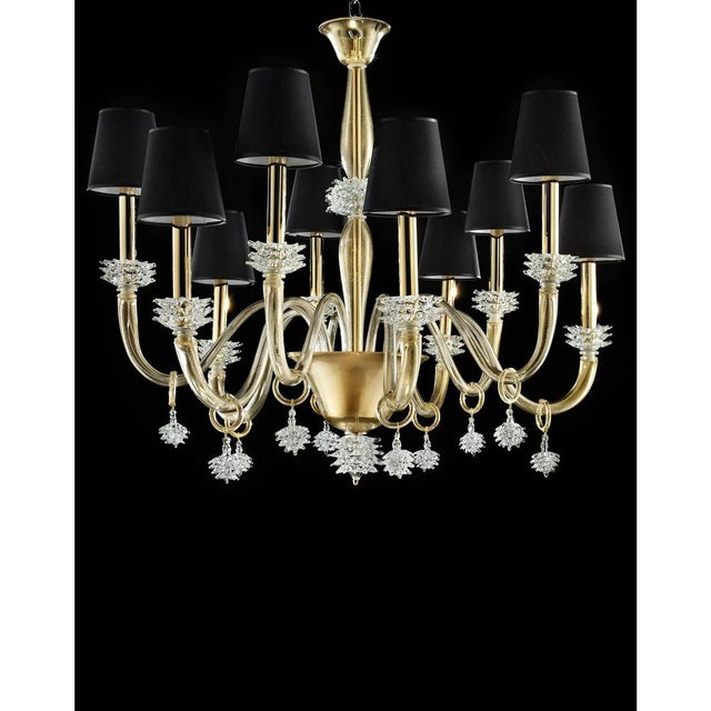 Contemporary transparent Chandelier in Murano Glass with “Rostrato” Cup full of gold leaf inside. Very luxury Chandelier...