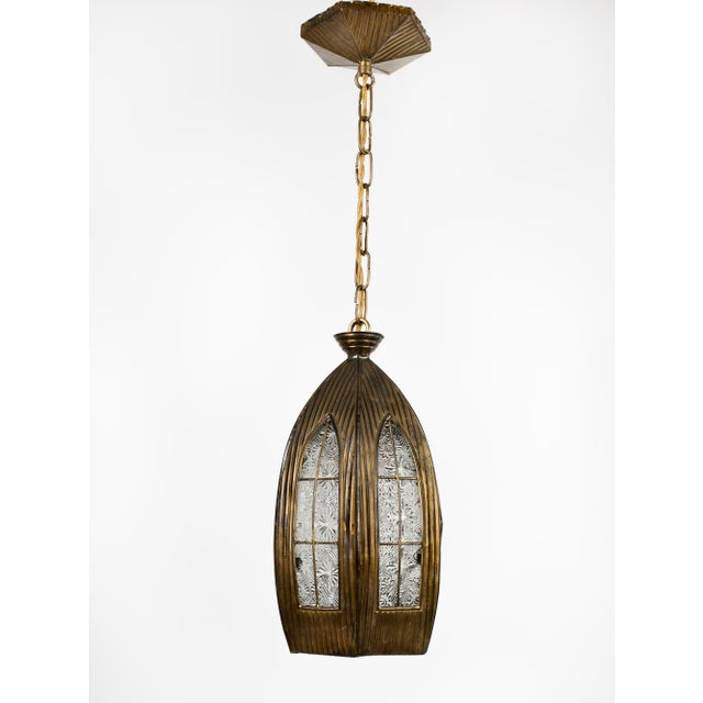 A handmade vintage Gothic pendant light .Is crafted from delicate ribbed sheet brass with a beautiful aged patina with...