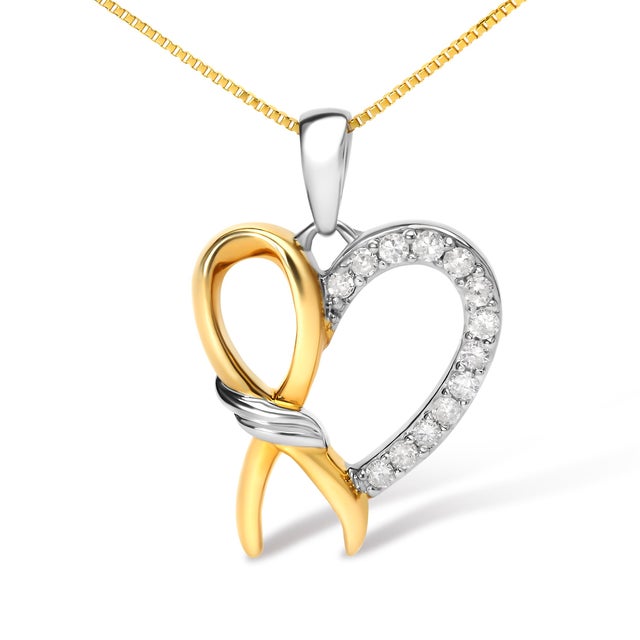 This heart pendant necklace is an ode to love and luxury. Crafted from 10K yellow gold plated .925 sterling silver, it...
