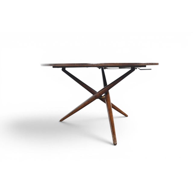 Origin: Switzerland Designer: Jürg Bally Manufacturer: Wohnhilfe Era: 1950s Materials: Stained Oak, Brass Measurements:...