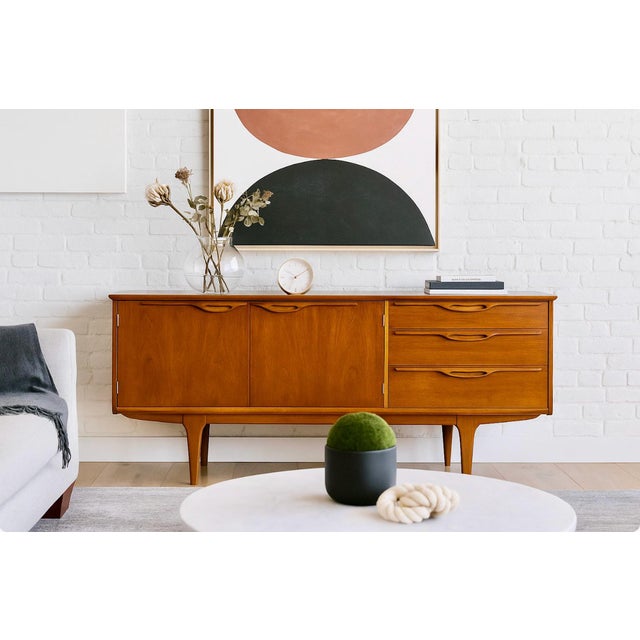 Mid Century Modern Teak Credenza / Media Stand designed by Tom Robertson and manufactured by A.H. McIntosh of Kirkcaldy,...