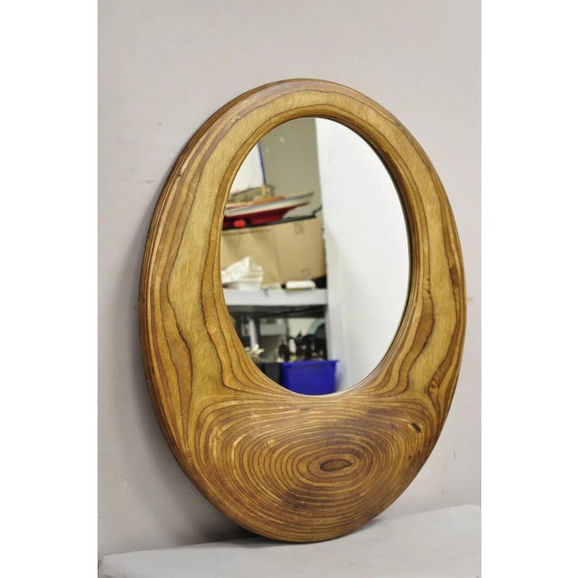 Vintage Organic Modern Laminated Bulbous Sculpted Hardwood Round Wooden Mirror, Signed Schwab. Circa Late 20th Century....