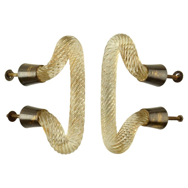 Venini 1940's Murano push and pull door handles or drawer- They are made of twisted clear glass, set in brass...