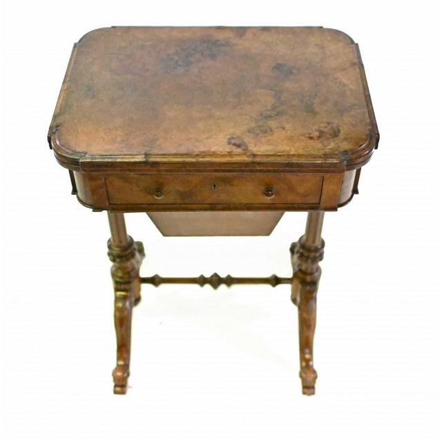 Elegant Victorian games table in walnut Top opens out to reval the chess - or draughts - chequered board Hand carved legs...
