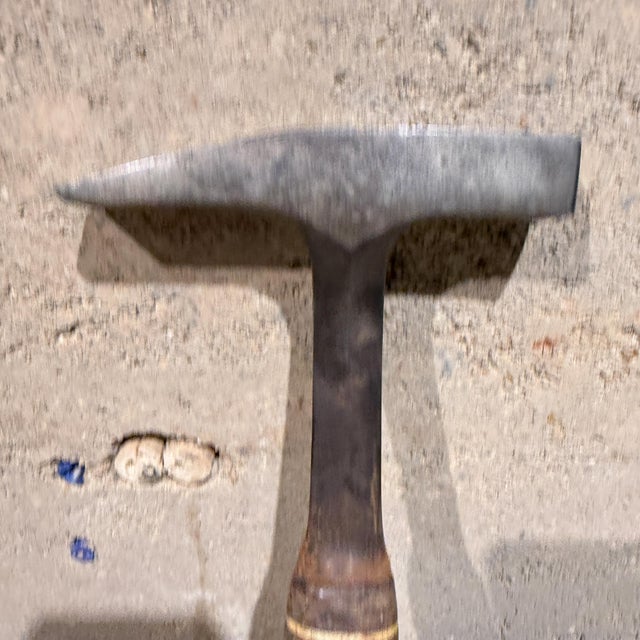For your consideration, a classic Estwing leather-handled rock pick (geology hammer), highly regarded for its single-piece...