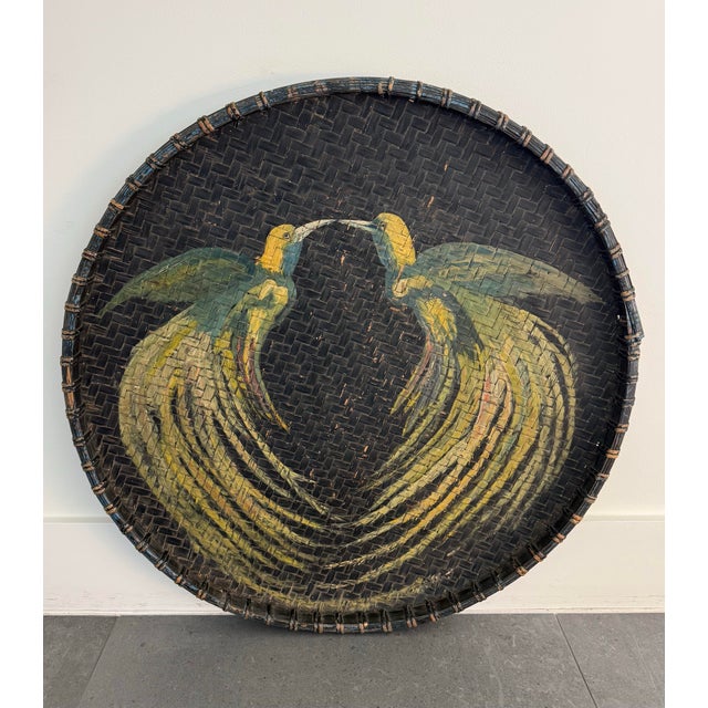 Large vintage round woven wicker shallow basket or tray with hand painted twin birds of paradise facing each other....