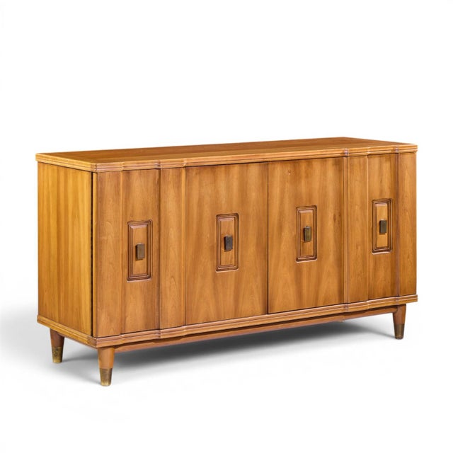 John Widdicomb Mid Century Walnut and Brass Credenza with Hutch The credenza measures: 60 wide x 20.25 deep x 32.25 inches...