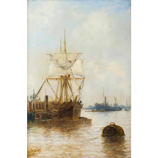 This is a beautiful English antique oil on canvas riverscape painting "Shipping on the Lower Thames" by Edward Henry...