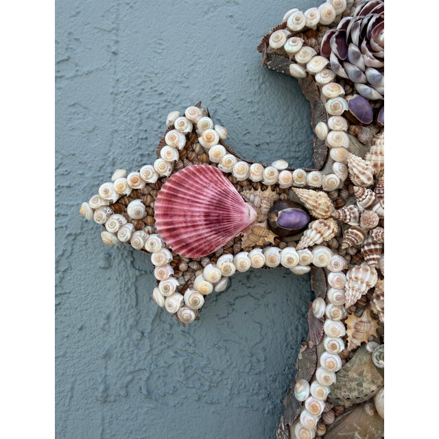 Christa's South Seashells 20"h. Cross with exquisite shells throughout including real pearls. This piece will be treasured...