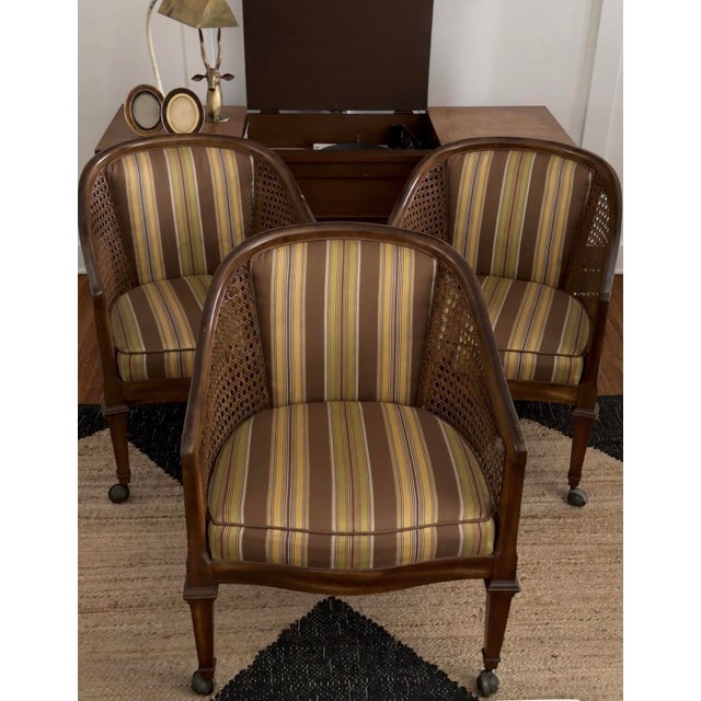Jack, Janet, and Chrissy would feel right at home with this playful 1970s trio. Mustard, olive, brown, and cream striped...