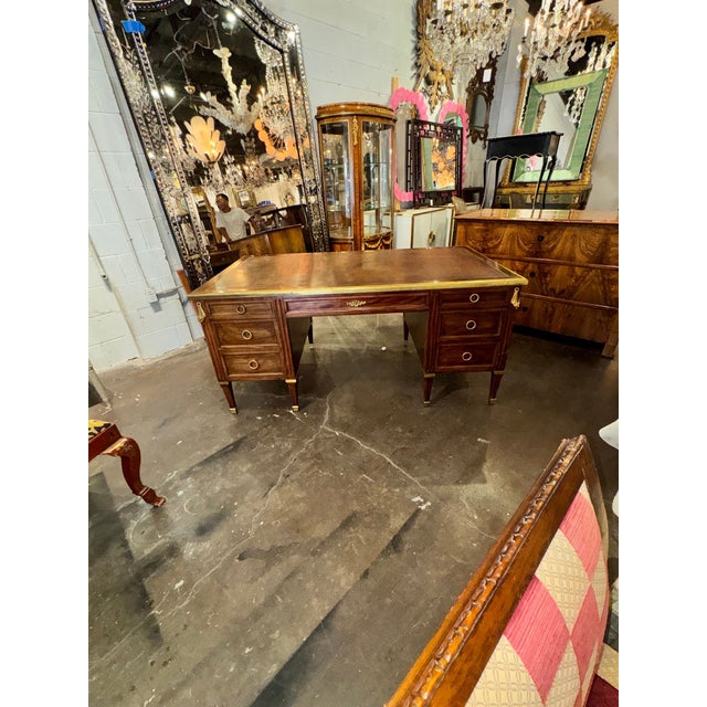 The 19th c. French Signed Paul Sormani walnut Desk is a beautifully crafted piece of furniture that exudes elegance and...