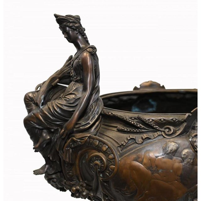 You are viewing monumental French bronze centerpiece or Jardiniere Two maiden figurines sit either side of the bowl At...