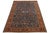 This stunning oversized rug showcases a contemporary take on the classic Serapi style, crafted from high-quality wool. Its...
