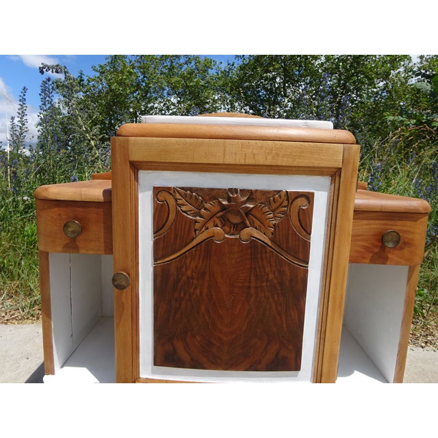 Light wood bedside table, Art Deco period and style. One large central cupboard with a burr walnut door and original knob...