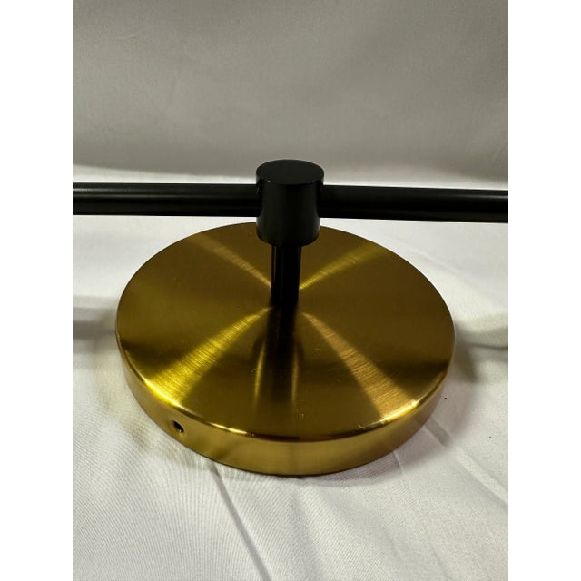 West Elm Double Bulb Brass and Black Sconce Chairish