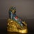 This is a striking antique cloisonné enamel sculpture of a tiger, depicted in a seated, alert posture with its head raised...