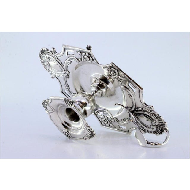 Silver Paddle with Cut-Out Floral Motifs, in Good conditions.