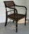 Antique early 19th century English Regency ebonized, gilt & caned side arm chair circa 1810. Beautifully executed with...