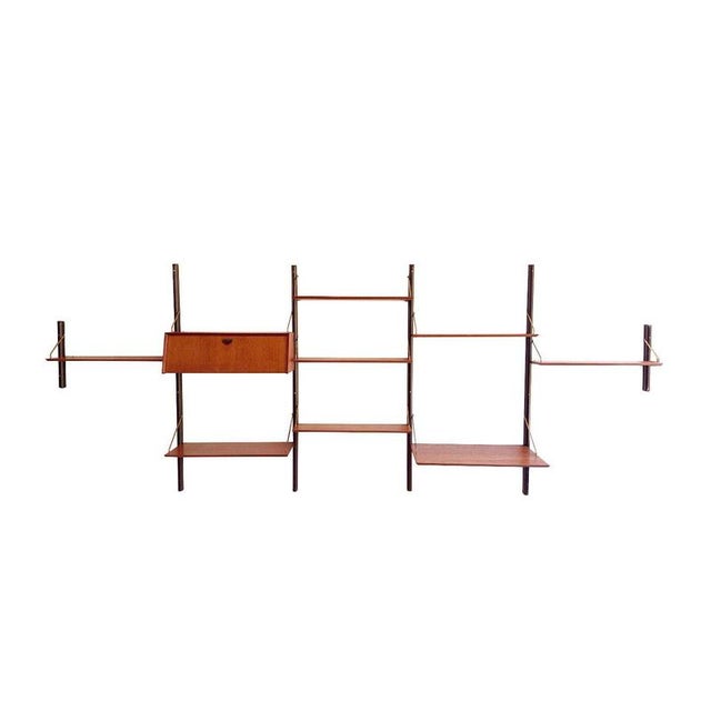 This vintage 5-piece wall system with a desk by Louis van Teeffelen is a stunning example of Dutch mid-century design in...