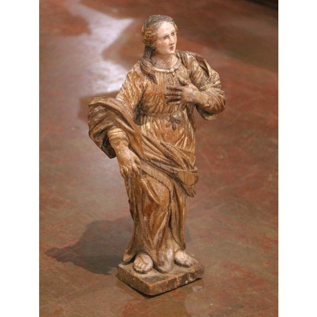 A beautifully aged antique devotional sculpture carved in France circa 1680 during the Louis XIV period. Hand-carved from...