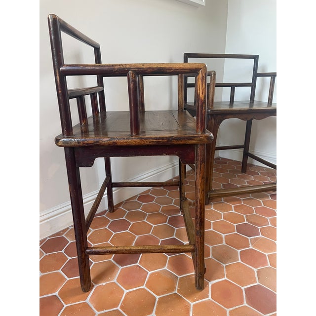 An exceptional pair of 19th-century Chinese low-back armchairs, traditionally known as Rose Chairs (Meiguiyi) or Southern...