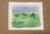 A tranquil watercolor interpretation of a summer countryside, where a distant line of trees dissolves softly into a...