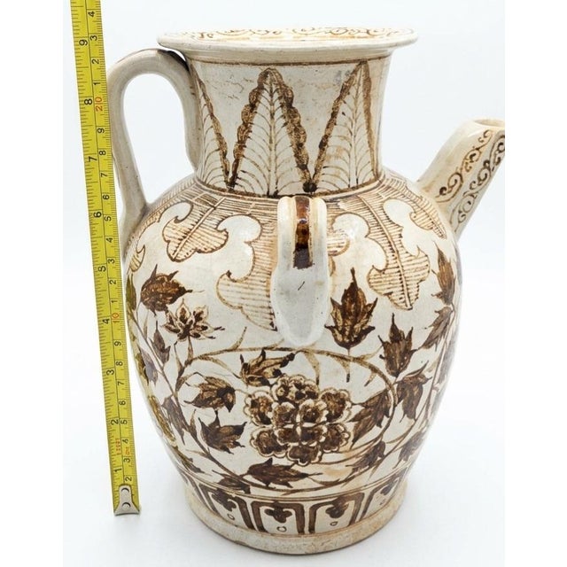 Chinese Cizhou or Jizhou-Style Painted Porcelain/Stoneware Ewer/Pitcher with dimensions of approximately 8"x6"x9". This...