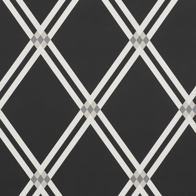 An interesting new take on a traditional pattern, Asolo is a handsome trellis with a bold, graphic look. Argyle elements...