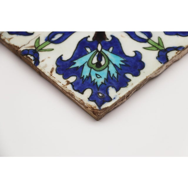 Antique White Tile From Damascus, Syria, 18th Century, Featuring Tulips and Alternating Floral For Sale - Image 8 of 12