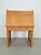 A unique Art Deco secretary made of wood. This antique piece of furniture dates from the 1930s. The secretary has four...