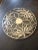Offered is a large antique sterling overlay trivet. It has a pretty art deco floral design and the center medallion is...