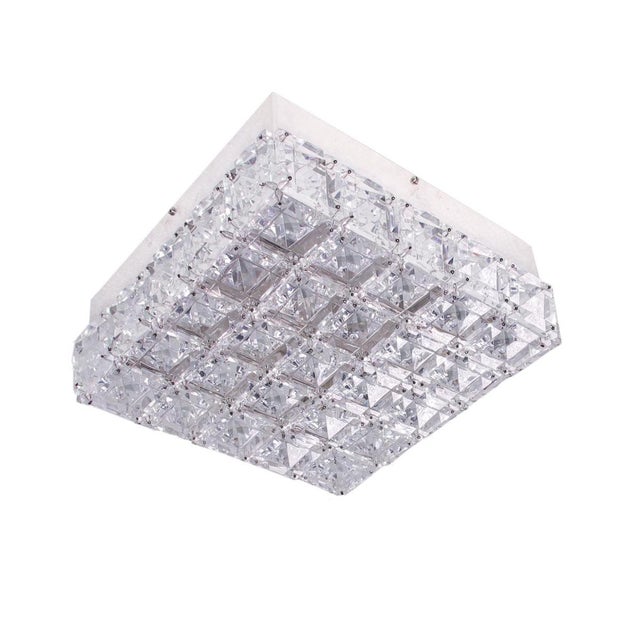 Elegant flush mount with faceted crystals on a chromed nickel frame. Designed by rolf gutbrod. Manufactured by lobmeyr /...