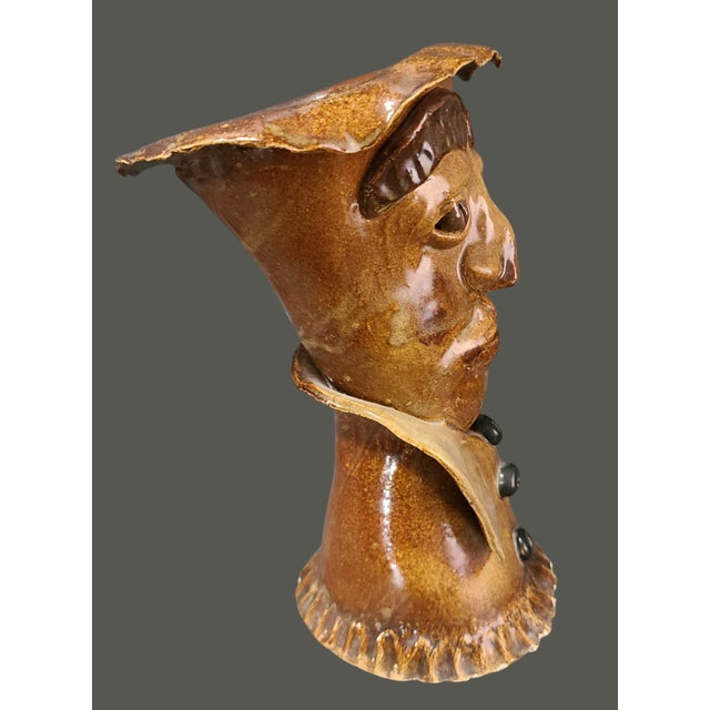 Crafted with an artisan's touch, this Vintage Mud Glazed Pottery Folk Art vase exudes a unique blend of character and...