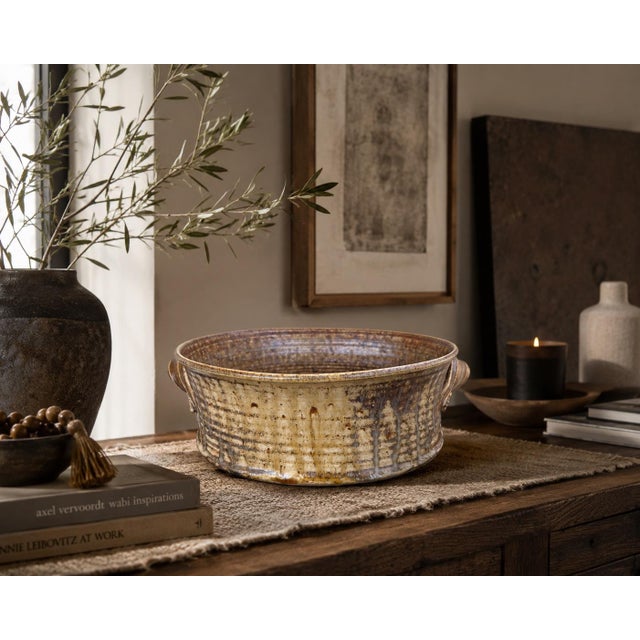 A striking signed studio pottery centerpiece bowl or cachepot featuring a richly textured hand-crafted form with...