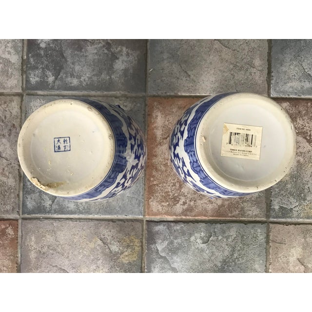 Large 14" Vintage Chinoiserie Blue & White Lotus Vases With Foo Dog Handles – Pair For Sale - Image 4 of 8