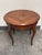 Design Plus Gallery presents a Vintage Round Parquetry Pull-Out Side Table by Acquisitions by Henredon. This round wood...
