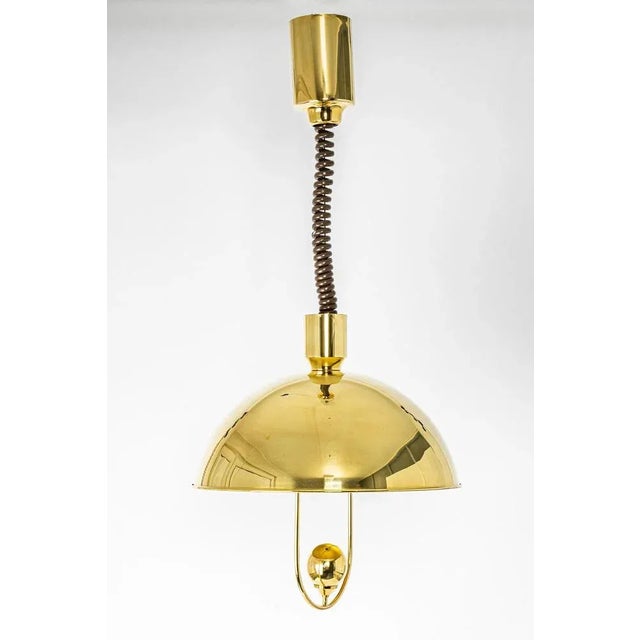 Petite brass pendant light designed by florian schulz, germany, 1970s. High quality and in very good condition. Cleaned,...