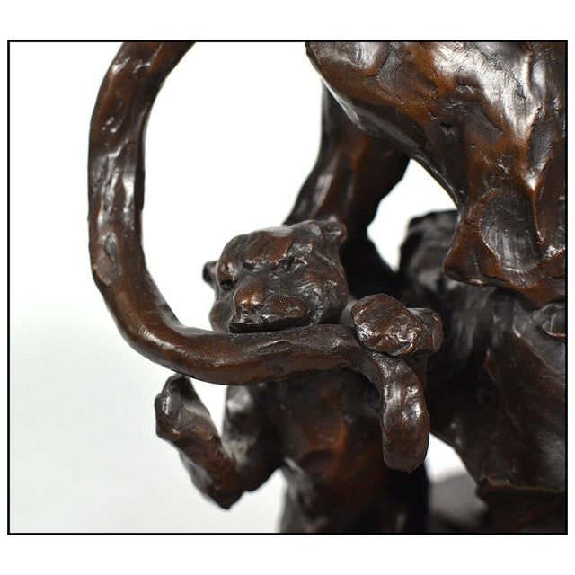 The artwork here, "Gotcha Cougars", is a wonderful depiction of a cub biting her mother's tail, that was designed with...