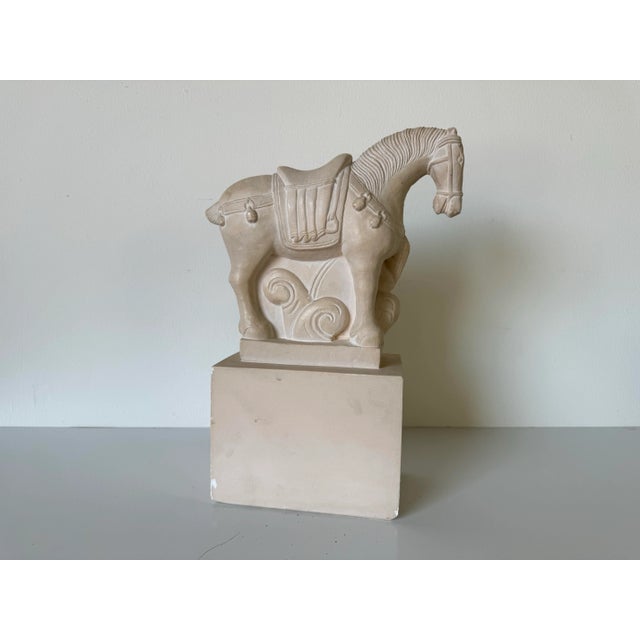 Vintage stylized ceramic plaster tang style horse figure sculpture. This well detailed Hollywood Regency tang dynasty...