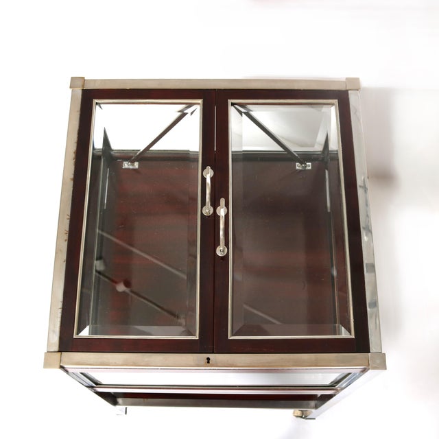 Bar Cabinet, in the form of a Lawyer's coffin. The inside storage compartment raises when you open the two top doors to...