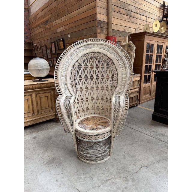 Large Emmanuelle armchair in wicker and rattan. In good overall condition, though with some signs of wear (see photos) and...
