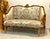 Bring timeless French elegance to your interior with this French Louis XVI-inspired sofa, featuring an intricately carved...