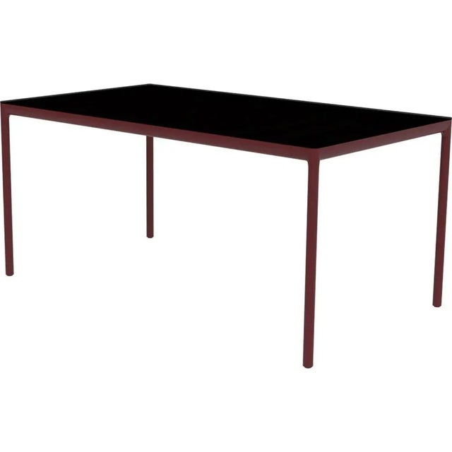 Ribbons burgundy 160 coffee table by mowee. Dimensions: d90 x w160 x h75 cm material: aluminum and hpl top. Weight: 21 kg....