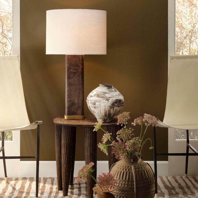 A simple, square body creates a clean canvas for the opulence of rich, luminous burl veneer. Touches of antiqued brass in...