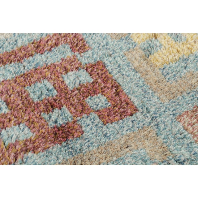 Hand-knotted in wool, this 2x3 gift-sized contemporary rug joins Rug & Kilim’s Scandinavian collection. Featuring soft sky...