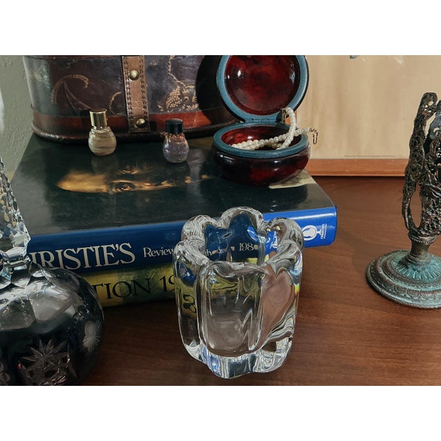 Signed Orrefors Swedish crystal votive featuring an elegant sculptural form with soft, organic contours. This heavy, high-...