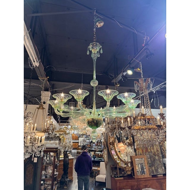 Modern Murano pale green glass 12-light chandelier. Circa 2000. The chandelier has been professionally rewired, comes with...
