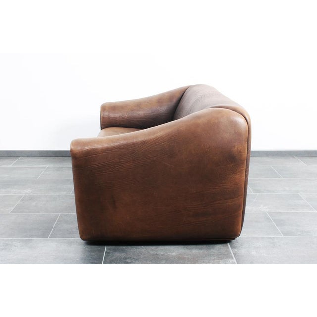 The seat can be extended with 40 cm, to get a more lounge comfort. This piece has an attribution mark, I am sure that it...