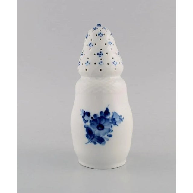 Royal Copenhagen blue flower braided sugar castor. Model number 10/8222. Dated 1965. Measures: 18.5 x 8.5 cm. In excellent...
